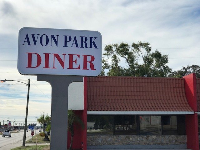 Classic diner booths and counter seating.